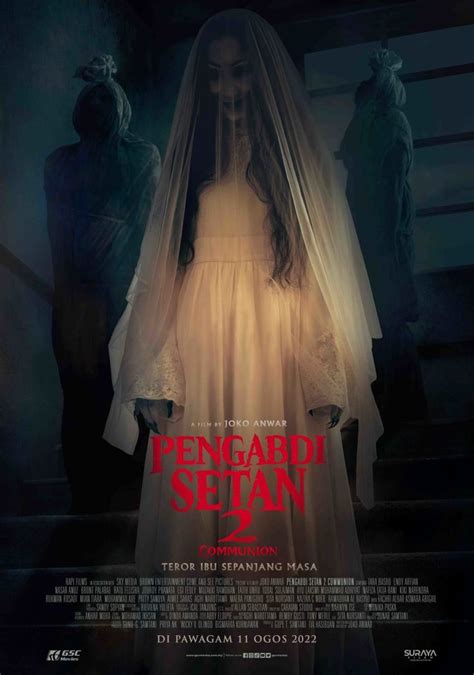 A Movie Poster For The Film Penggard Setan Featuring A Woman In White Dress