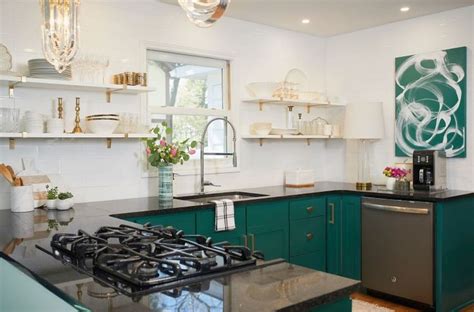 Pale green tiles create a backsplash the compliments both dominate colors of the room. The 2019 Best Dark Greens for Kitchen Cabinets | Green ...