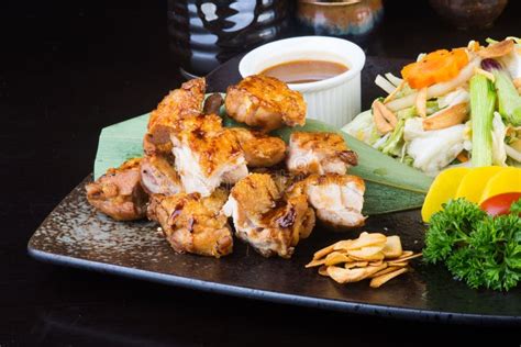 Japanese Cuisine Grilled Chicken On The Background Stock Photo Image