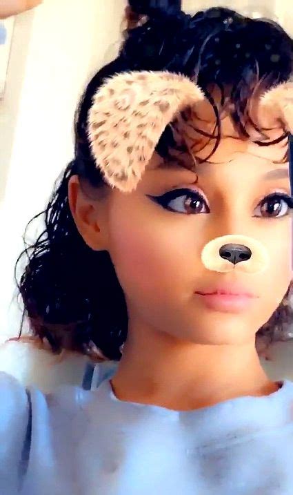 Ariana Grande Gives Fans A Rare Glimpse Of Her Natural Curly Hair
