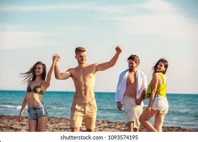 Group Friends Together On Beach Having Stock Photo Shutterstock