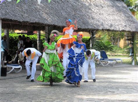 Performers In Traditional Dress Dance At Resort In Cuba Editorial