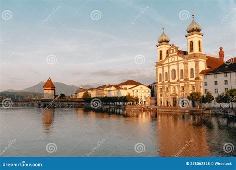 Beautiful Shot Of Historic Buildings On The Shore Of A Lake In Lucerne Switzerland Stock Photo