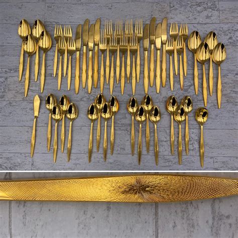 Maybe you would like to learn more about one of these? Vintage Gold flatware set service for 8 Gold plated Silverware by Stanley Roberts