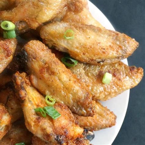 Pat chicken wing parts dry with a paper towel and place in a bowl. Extra Crispy Baked Chicken Wings with Garlic Recipe ...