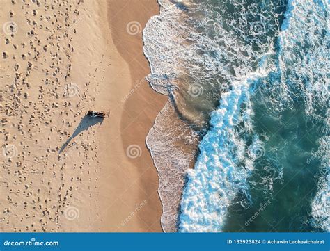 Aerial View Of The Ocean Waves Washing On The Beach Stock Photo Image