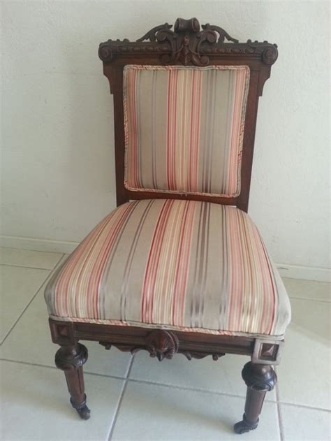 chair  carved  wood casters  antique furniture collection