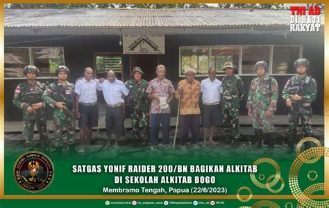 Satgas Yonif Raider Bn Bagikan Alkitab Di Sekolah Alkitab Bogo