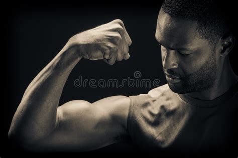 Young African American Man Flexing Biceps Stock Photo Image Of Build