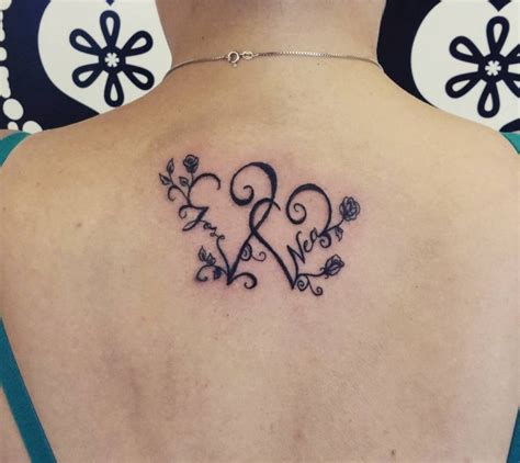 27 Inspiration Intertwined Heart Tattoo Designs