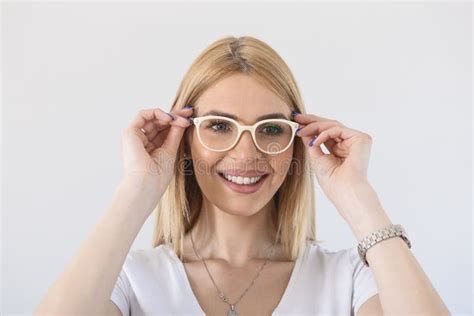 Smiling Brunette Woman In Eyeglasses Posing She Is Touching Her