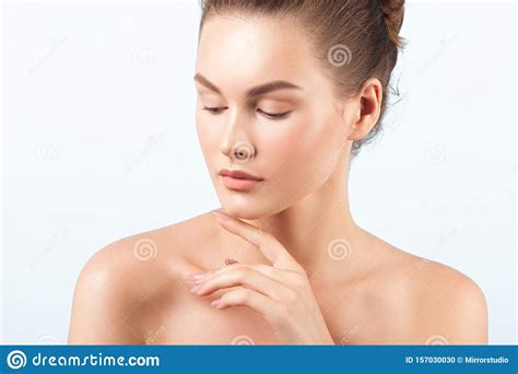 Young Beautiful Woman With Clean Perfect Skin Close Up Stock Photo