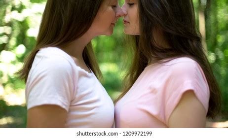 Two Lesbians Kissing Publicly Expressing Feelings Stock Photo