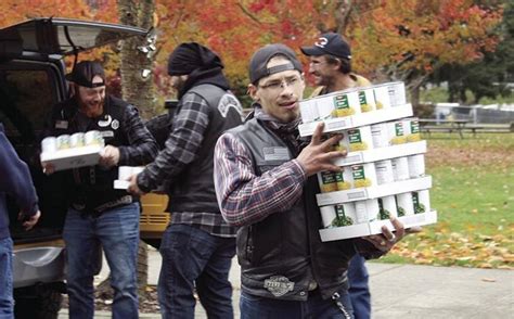 Local Motorcycle Club Collects Food For Arlington Food Bank Biker