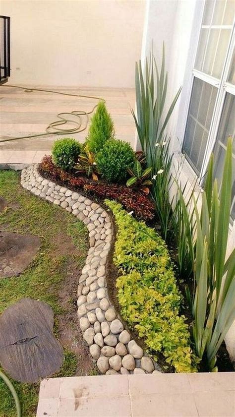 Looking for some stylish small backyard landscaping ideas? 25 Beautiful Front Yard Rock Garden Landscaping Design Ideas # #frontyard #gardendecoration ...