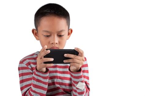 Premium Photo Asian Boy Is Playing Games On His Smartphone Isolated