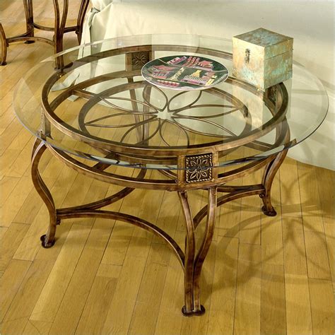 The coffee table is 32.5 in diameter and the end tables are 21.5 wide, so this set can fit in smaller seating areas. 10 Best Collection of Modern Glass Top Coffee Tables and ...