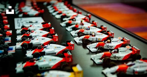 A Close Up Of Many Toy Cars On A Table Photo Free Car Image On Unsplash