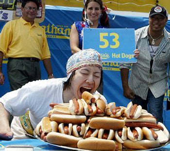 Before kobayashi ate 50 hot dogs with buns in 12 minutes, the record stood at 25 1/8 in the same amount of time, but after his performance, the record was regularly broken and now stands at 72 in 10 minutes. the other paper: Kobayashi Will Compete in Nathan's Hot Dog Eating Contest Via Satellite