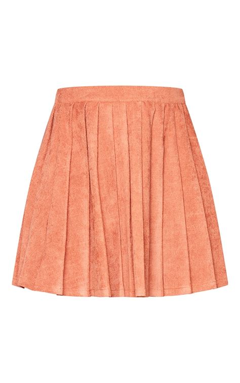 Rust Cord Pleated Skater Skirt Skirts Prettylittlething Usa