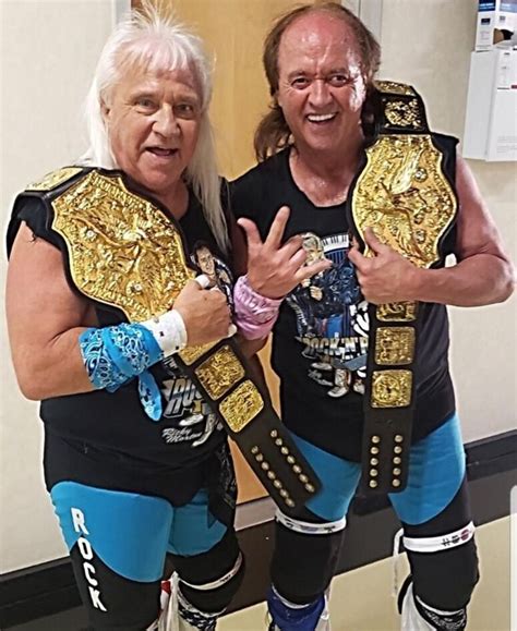 ricky morton 63 robert gibson 61 the rock and roll express after winning the nwa tag team