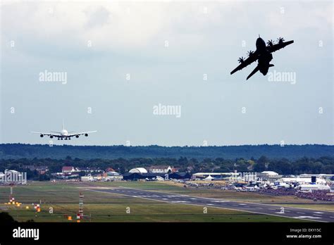 Airbus A380 Landing While Airbus A400m Atlas Takes Off For A Display At