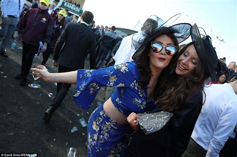 Grand National Racegoers Dress To The Nines For Ladies Day Daily Mail