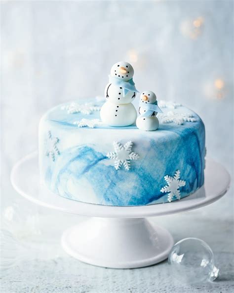 This christmas cake is delightfully different with the delicious pecan marzipan and brandy butter icing. How to make a snowman Christmas cake | delicious. magazine ...