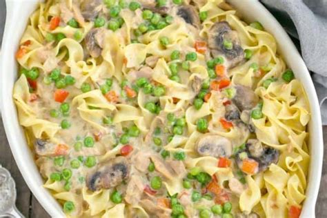 Campbell's® condensed cream of mushroom soup flavors a creamy sauce that is mixed with tuna, egg noodles and peas, topped with a crunchy bread crumb topping and baked to perfection. Tuna Noodle Casserole from Scratch - That Skinny Chick Can Bake