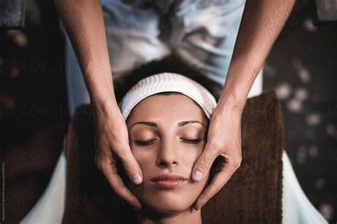 Face Care Woman Relaxing On Massage Table For Facial Spa Treatment By Stocksy Contributor