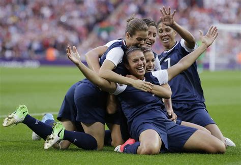 Carli Lloyd Center Celebrates With Teammates After Scoring During The