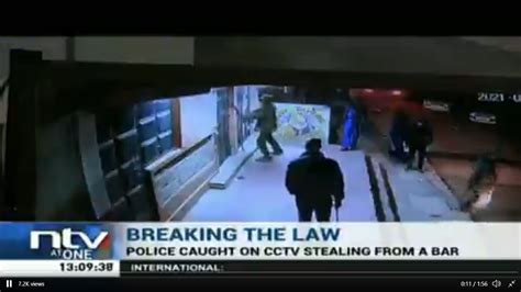 Police Caught On Cctv Breaking Into A Bar And Stealing Liquor In The