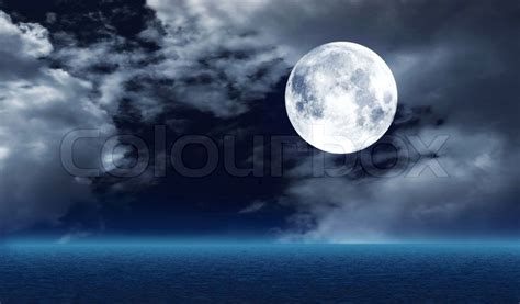 The Full Moon Over Water Stock Photo Colourbox