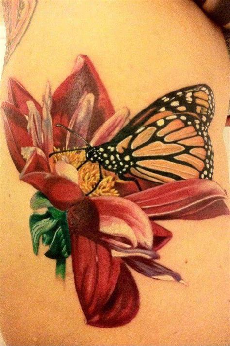 A Beautiful Butterfly And Flower Tattoo Based On A