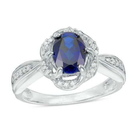 Oval Lab Created Blue Sapphire And 110 Ct Tw Diamond Frame Ring In