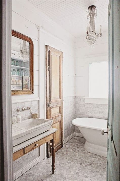 A little sanding removes the surface's finish to differentiate the countertop from the dresser frame. Antique Vintage Style Bathroom Vanity Inspiration - Hello ...