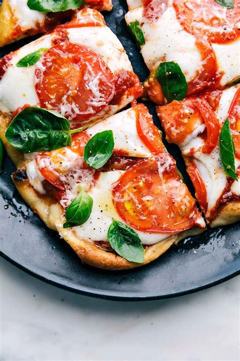 Upgrade your pizza night with this margarita pizza recipe from food.com. fattributes: "Margherita Pizza " | Margherita pizza ...