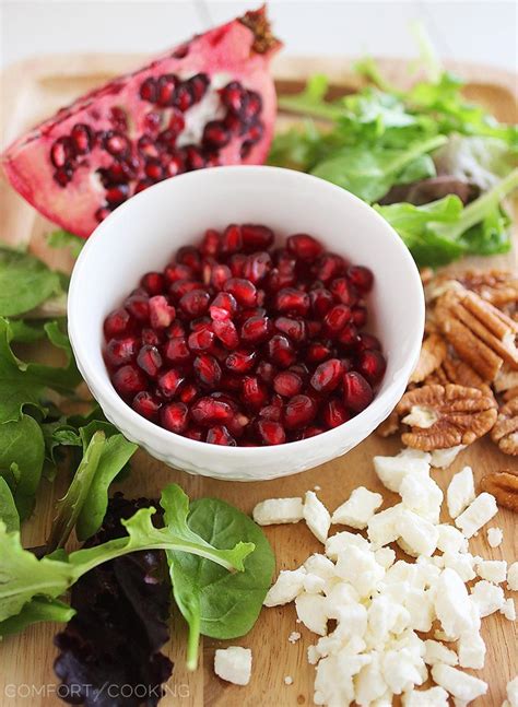 Mixed Green Salad With Pomegranate Seeds Feta And Pecans The Comfort
