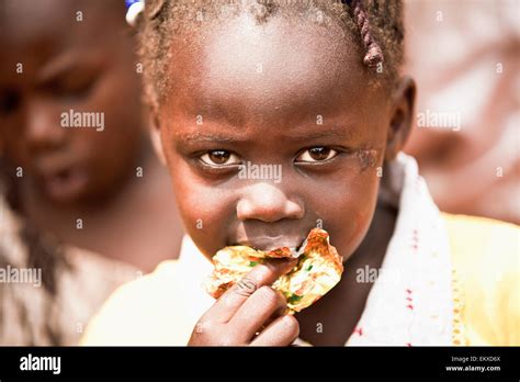 A Girl Eating Kampala Uganda Africa Stock Photo Alamy