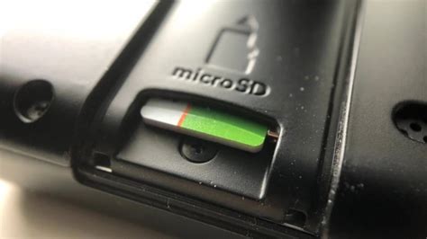Push the microsd card in until you feel a little resistance. What's the best microSD card for Nintendo Switch? | Ninty Gamer