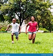 African Kids Running Together in Park. Stock Photo - Image of ...