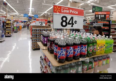 Sign Advertising Everyday Low Price Of Sams Brand Soft Drinks At A