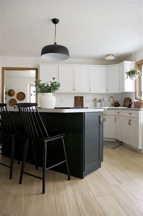 This basic white paint shade looks great with every color palette white kitchen cabinets look crisp and clean next to a variety of colors, but as you can see. Kitchen Cabinet Refresh with BEHR | brepurposed
