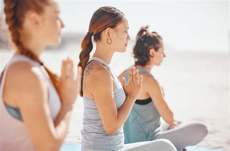 Women Doing Meditation Class For Wellness On Beach Spiritual Training
