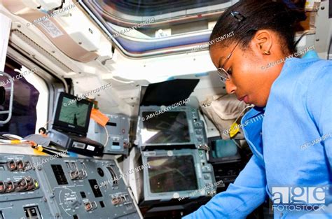 astronaut stephanie wilson sts 120 mission specialist photographed on the aft flight deck of