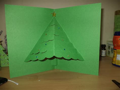 This is the easiest pop up christmas card to make with fewer materials. 3D Pop Up Tree Card | AllFreeChristmasCrafts.com