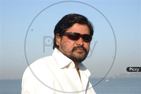 Image of Indian Man Wearing Shades Sunglasses-UN019448-Picxy