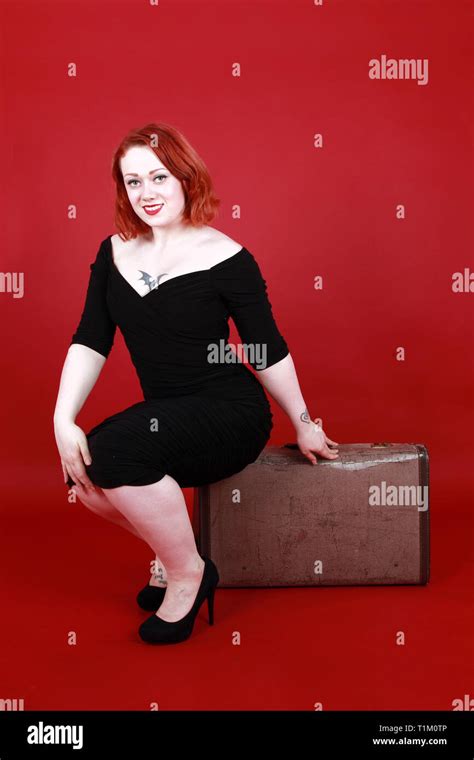 1950s Pin Up Girl Woman With A Suitcase Stock Photo Alamy