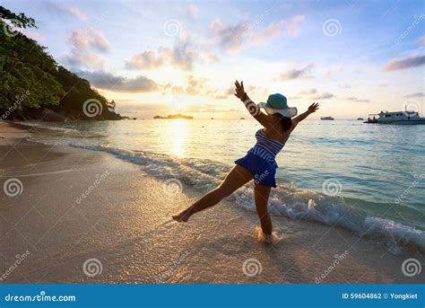Happy Girl On The Beach At Sunrise Stock Photo Image Of Beautiful
