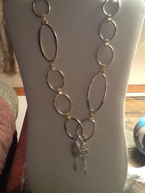 Very Cool And Super Trendy Large Loop Necklace With Silver Key Pendents